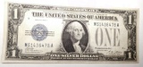 1928-A $1.00 SILVER CERTIFICATE BORDERLINE UNC