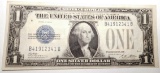 1928-A $1.00 SILVER CERTIFICATE BORDERLINE UNC