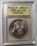 1884 O/O VAM 21-A MORGAN DOLLAR USCG MS-65