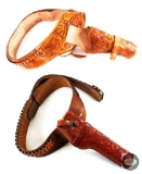 Two Embossed Leather Handgun Belts from Hunter and Heiser