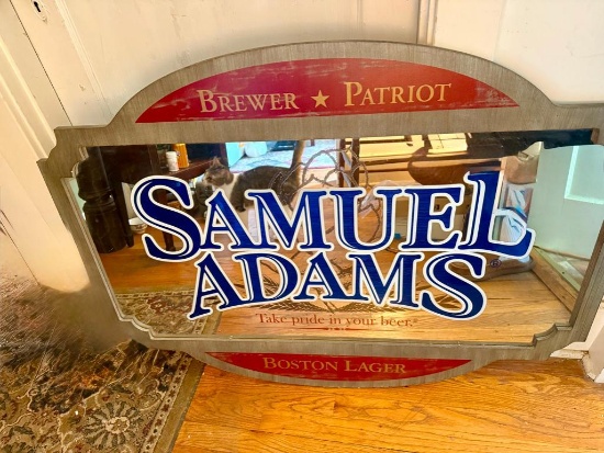 Samuel Adams mirrored Bar sign, which reads atake pride in your beer, and has Brewer Patriot logo