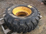 Titan 15-19.5 backhoe tire mounted on rim
