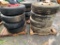 8 used tires with stud and pilot rims