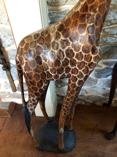 Wooden carved giraffe stands 61" tall, excellent condition and detail