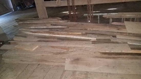 3 stacks of lumber, (some old)