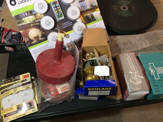 LED puck lights, sewer snake, sandpaper and door latches and registers