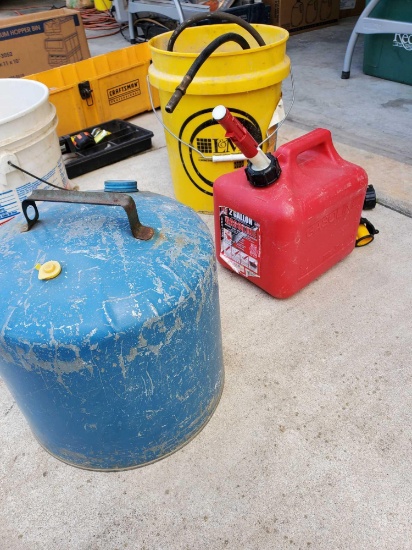 2- Gas cans, 2 grease guns, tool box w/ msc. tools