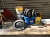 Tote with wheels and buckets and rebar