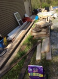 Remaining miscellaneous lumber, 5 gallon buckets, window and vent and plastic fencing