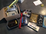 Socket set not complete, wrenches, jumper cables, laser level, shims, rotary phone and fax machine
