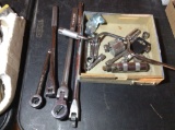 Swivel ratchets, sockets and breaker bars
