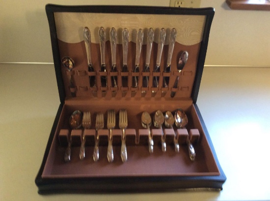 Silverware chest with utensils