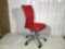 Swivel office chair in red