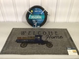 Welcome mat and garden hose