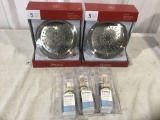 Two brushed stainless steel five function showerheads and
