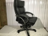 Swivel office chair in black leather type upholstery