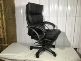 Swivel office chair and black leather type upholstery