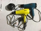 Two electric hair dryers