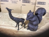 Metal giraffe and cast iron squirrel post topper