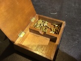 Wooden duck box with approximately 40 .22 short bullets