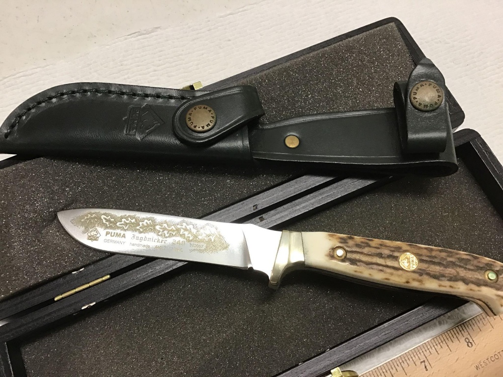 Puma knife with leather sheath | Guns & Military Artifacts Knives, Blades &  Tools | Online Auctions | Proxibid