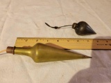 Brass and steel plumb bobs