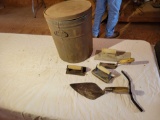 Metal lard can and masonry tools