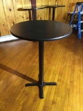 30 inch round black table with steel base