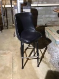 Black swivel bar chairs with backs