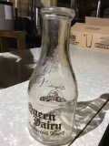 Queen dairy glass milk bottle
