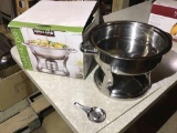 Stainless steel chafing dish.