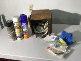 box electrical items and 3 spray cans