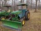 John Deere 1050 w/ plow and soft cab 1691 hours