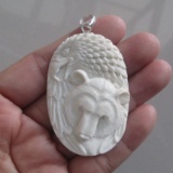 Hand Carved Bear & Eagle Pendant