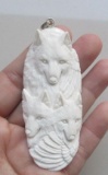 Hand Carved Wolf Family Pendant