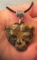 Hand Carved Leopard Petrified Wood Opal Pendant