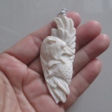 Hand Carved Wolf & Eagle Pendant