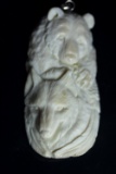 Hand Carved Bear & Wolf Pendant