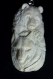 Hand Carved Bear & Wolf Pendant