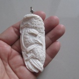 Hand Carved Eagle Family Pendant
