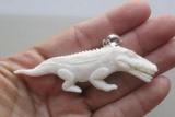 Hand Carved Dinosaurus Pendant