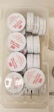A Tub full of various colors of Nail Hole and Corner Filler