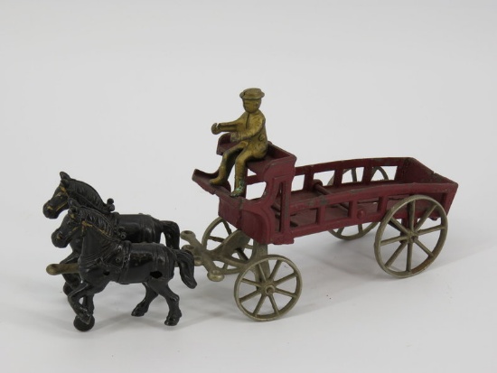 Cast iron dray wagon with 2 horses & driver