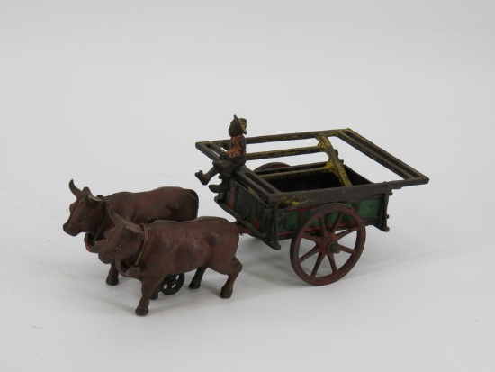 Rare ox cart with hay insert & driver, c. 1895