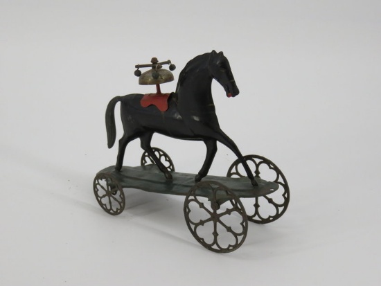 Fantastic Fallows tin bell horse with eccentric wheels
