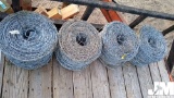 (4) ROLLS OF BARBED WIRE