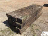 QTY OF (16) BUNDLED RAILROAD TIE LOGS