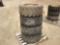 QTY OF (4) SKID STEER TIRES W/ RIMS