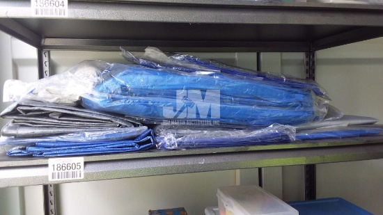 SHELF OF MISC TARPS / SHELF NOT INCLUDED