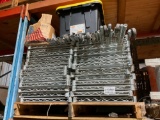 PALLET W/ ROLLING STORAGE RACKS
